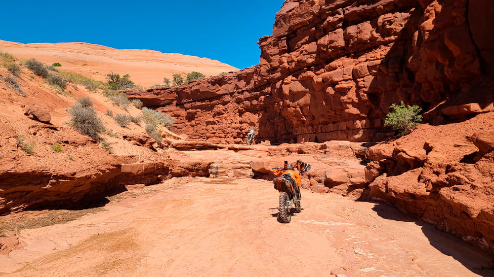 motorycle parked in a red canyon
