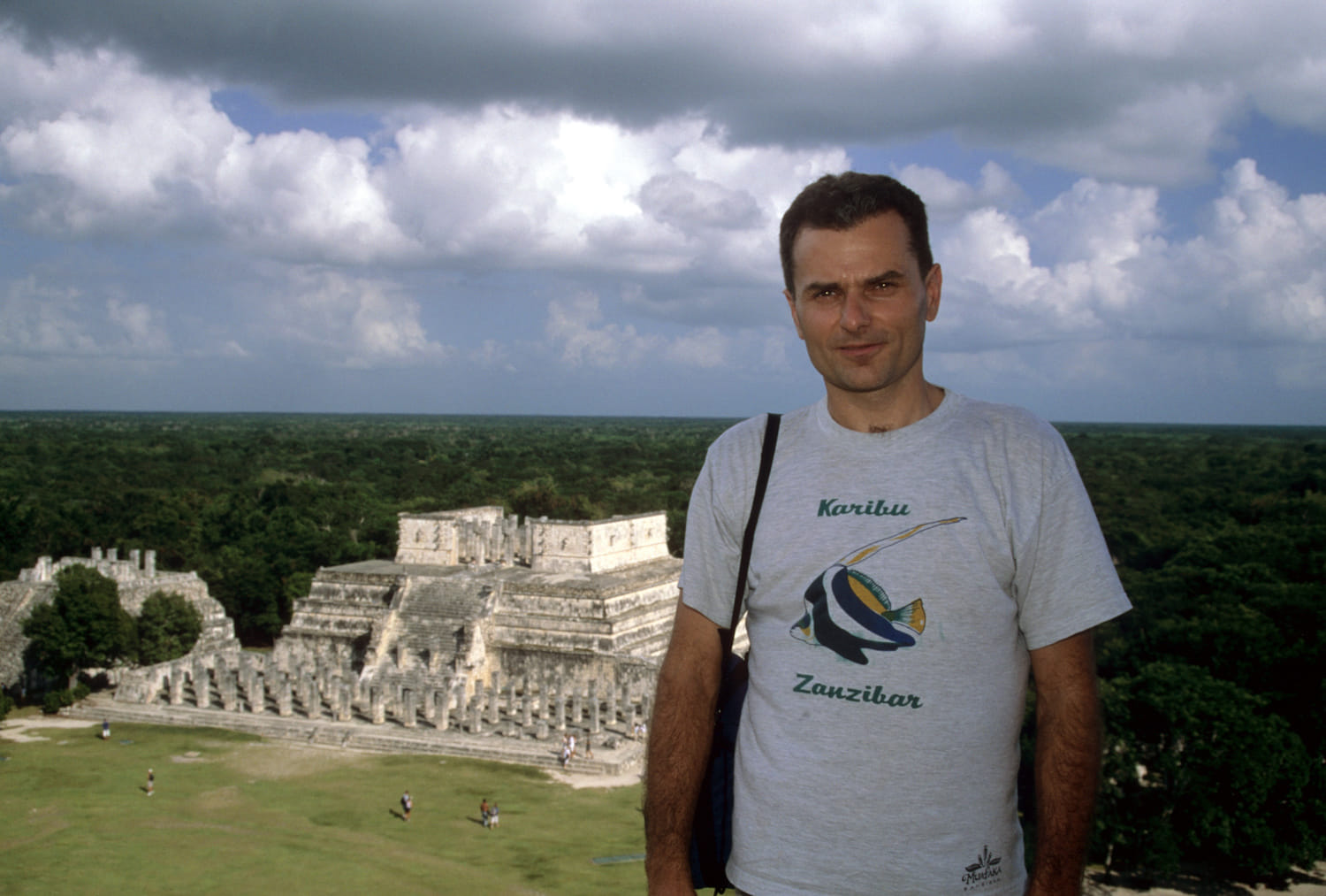 person in front of a pyramid