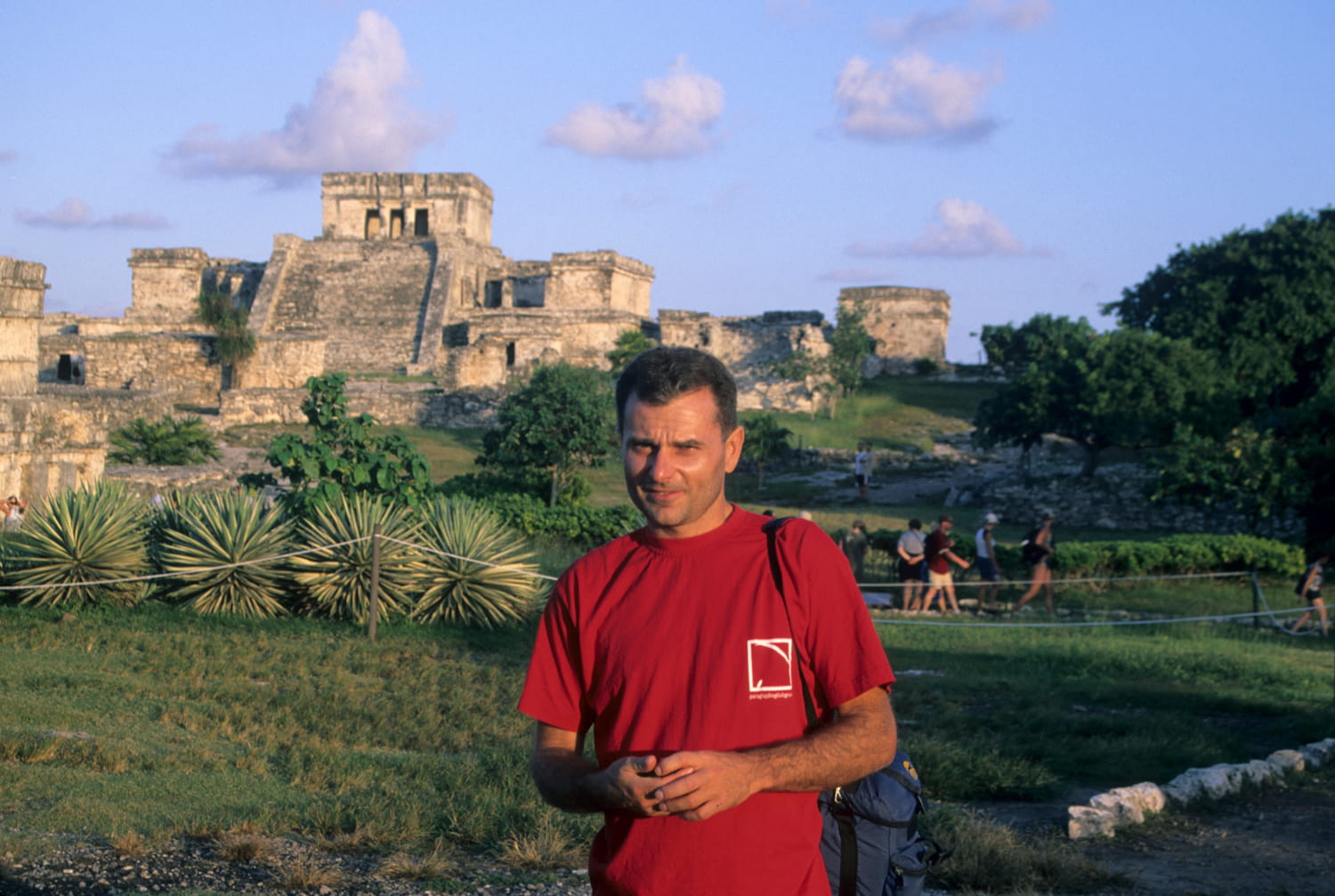 person in front of a pyramid