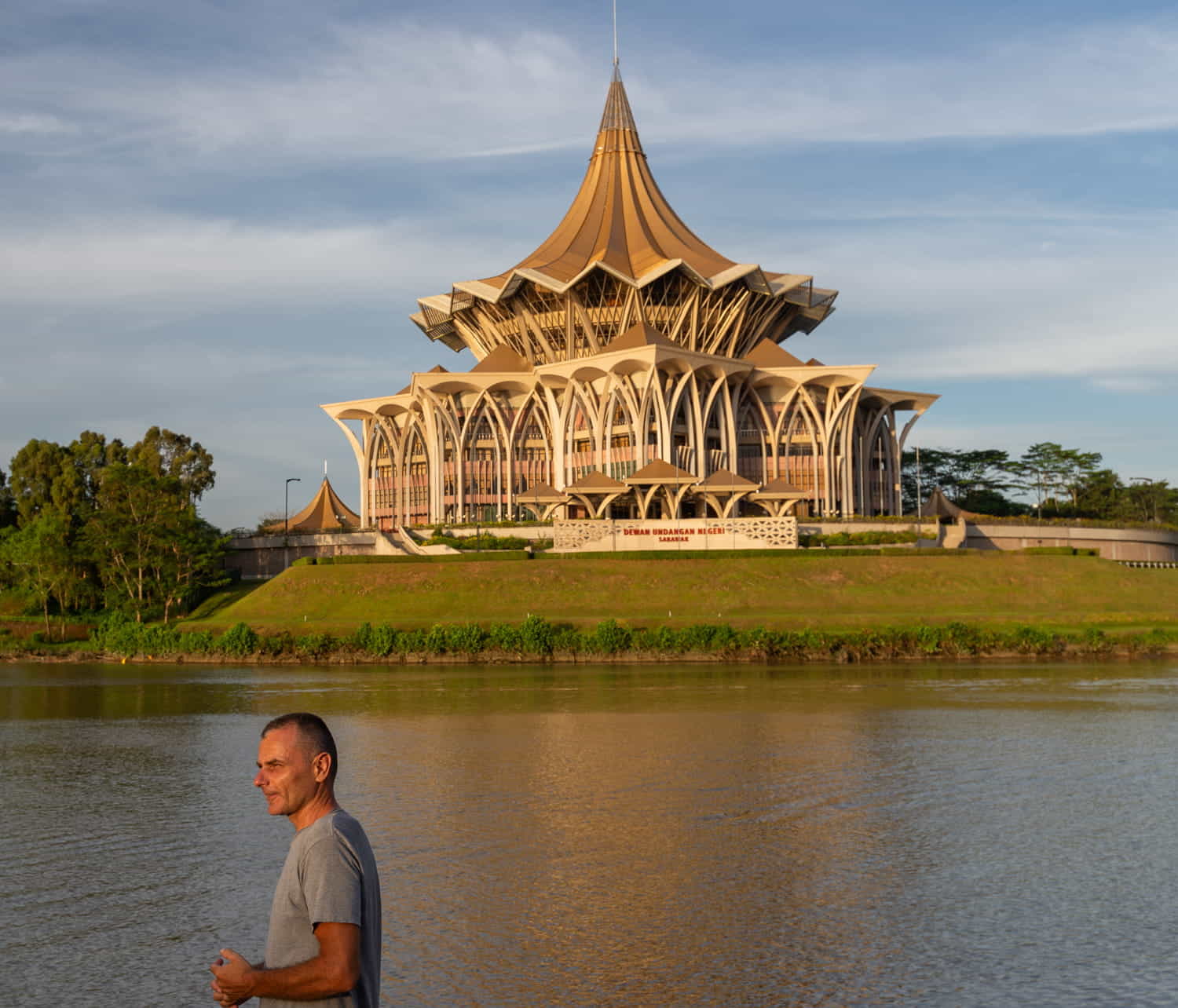 a person in front of an intersting building