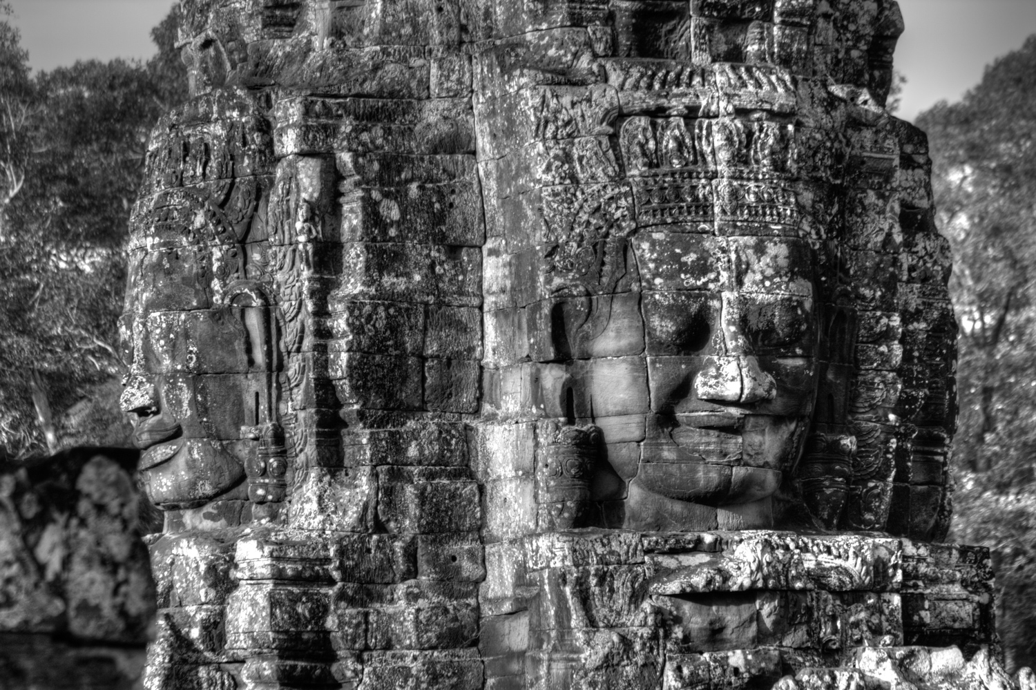 faces carved in stone blocks