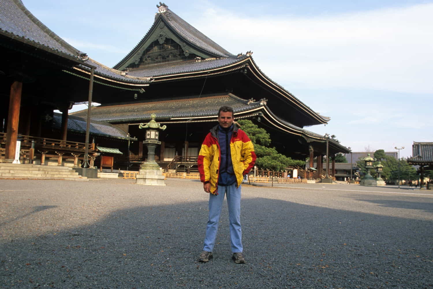 person next to a big temple