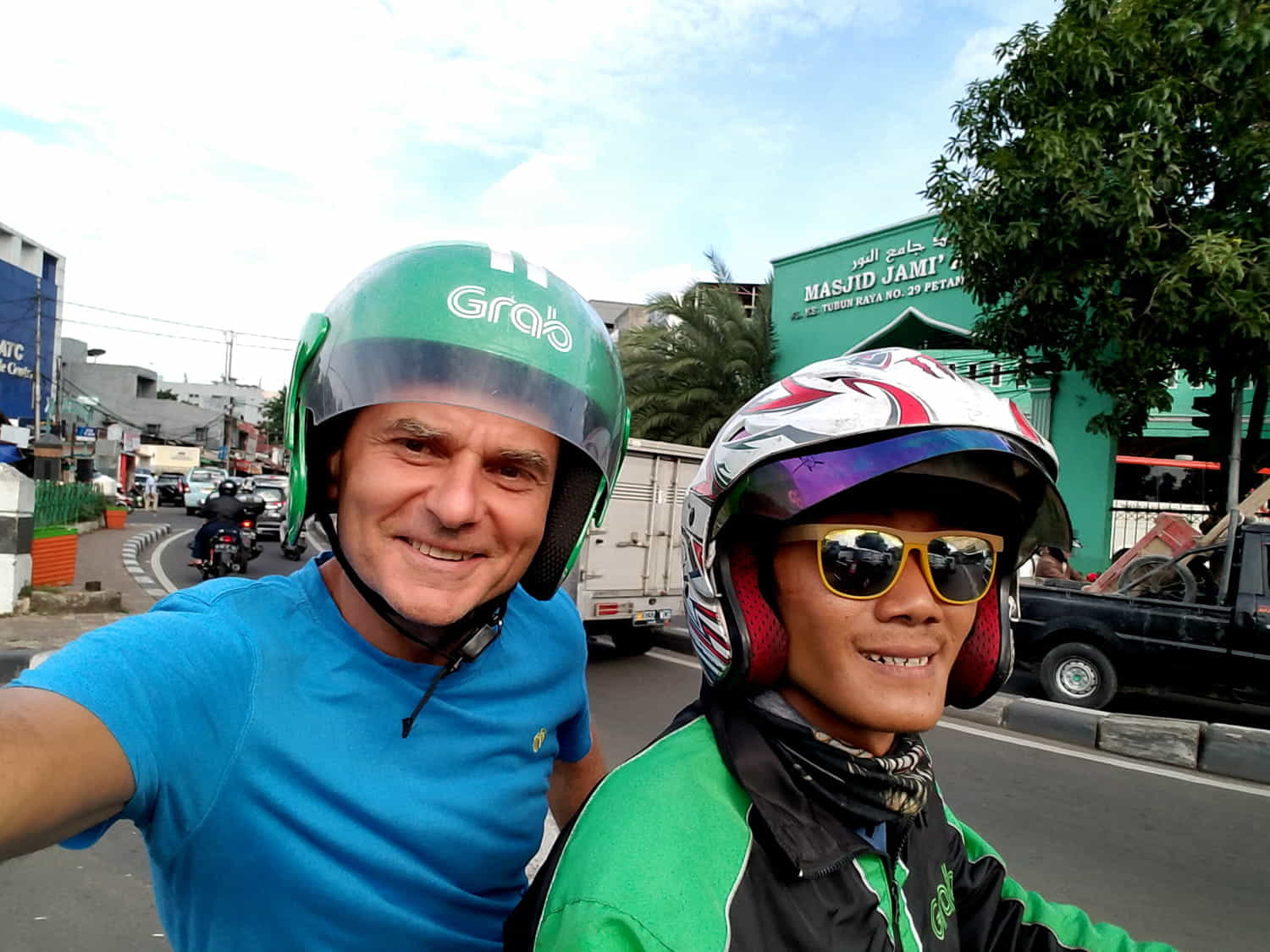 selfie with a motot taxi on a scooter 