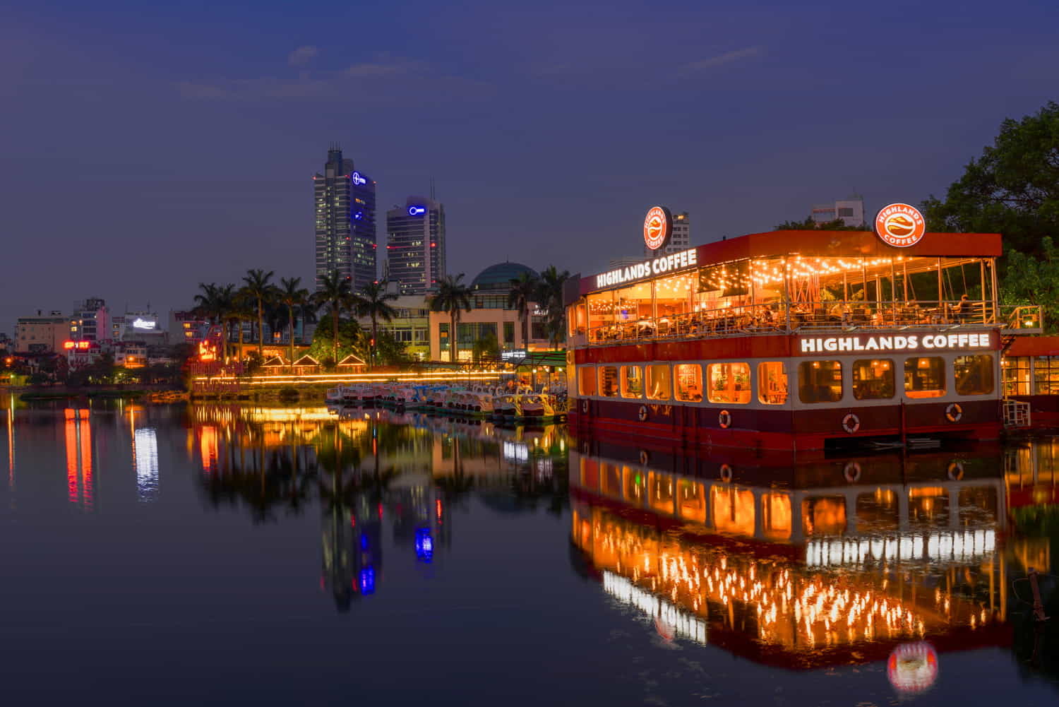 a floating restaurant on a lake