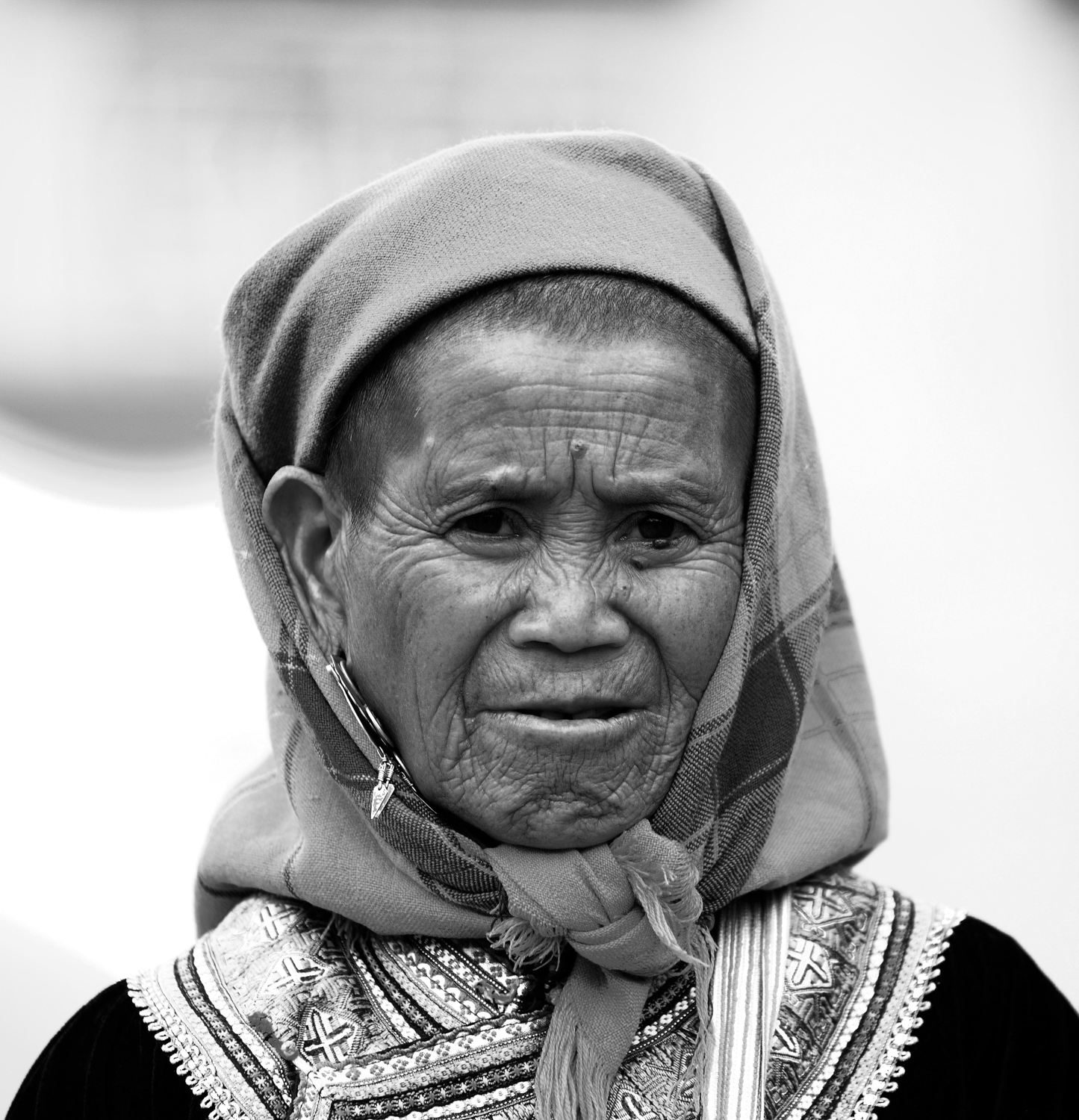 a black and white portrait of a lady