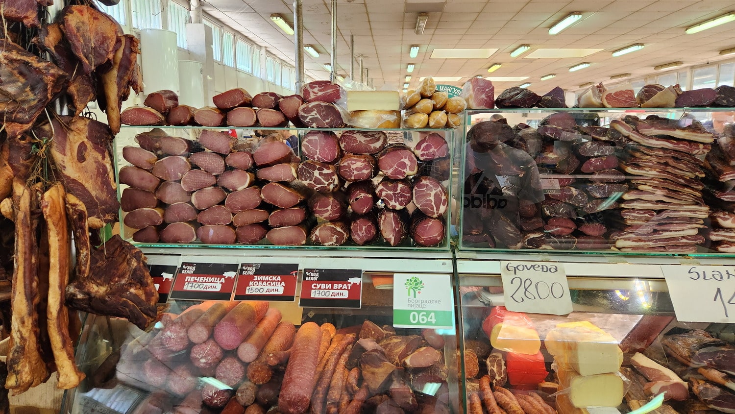 various smoked meats in a display