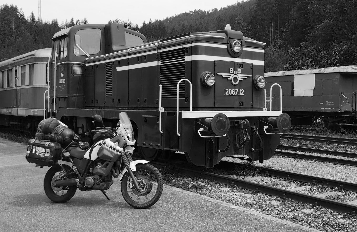 motorcycles to an old train