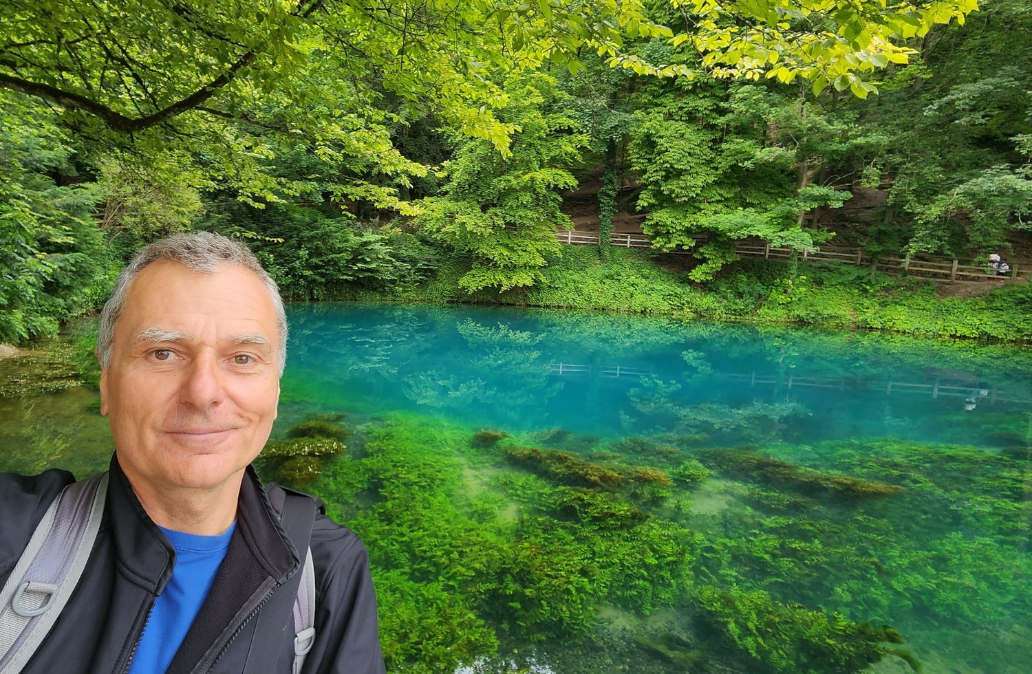 selfie next to a blue lake