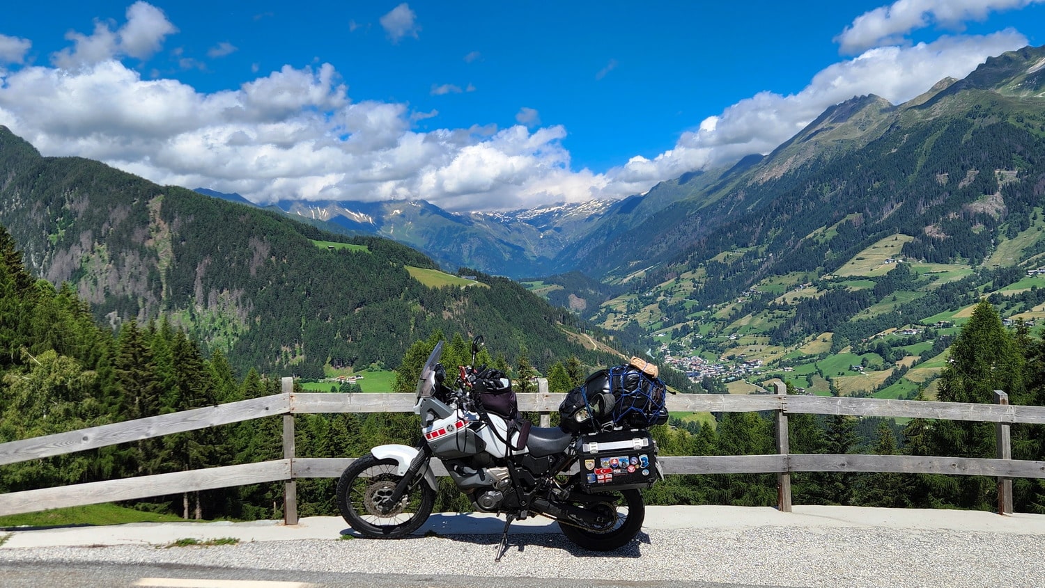 motorbike on a road high above a valley