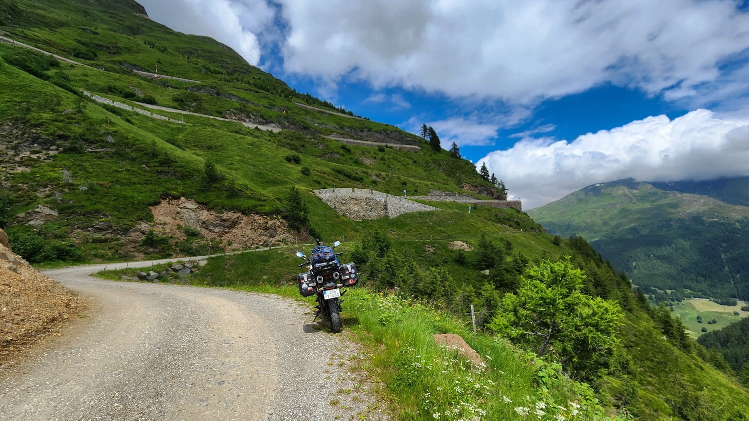 motorcycle parked with switchbacks above it