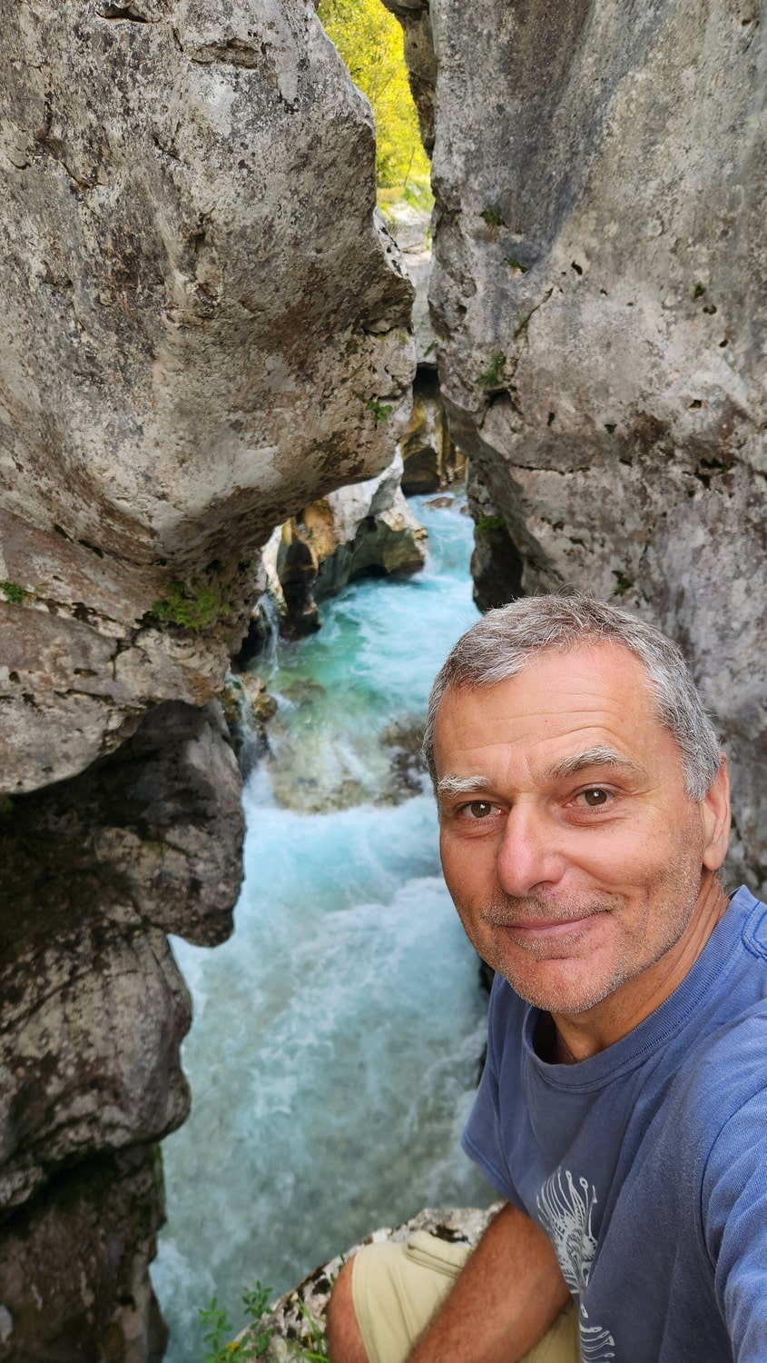 selfie in a deep canyon with turquise river flowing through