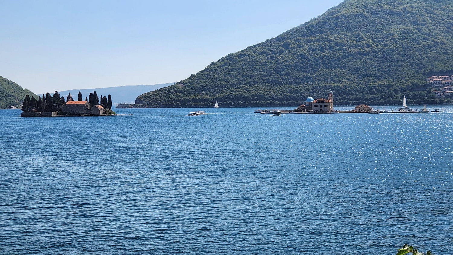 two tiny islands with churches on them