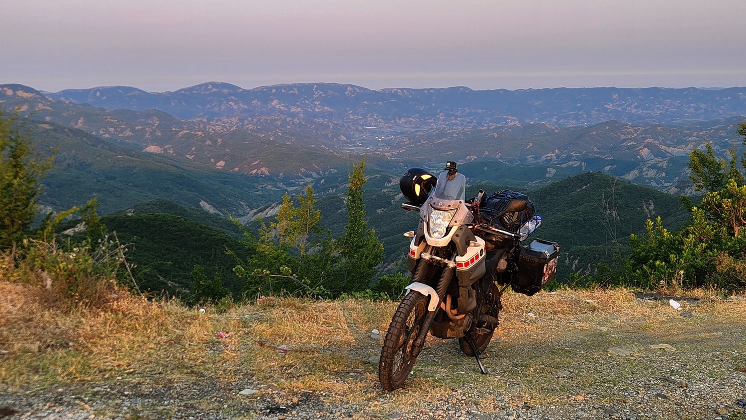 motorcycle and mountains behind