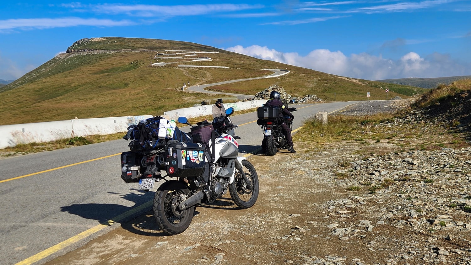 motorcycles with switchbacks behind