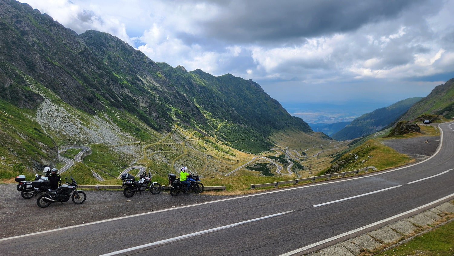 motorcycles with switchbacks behind