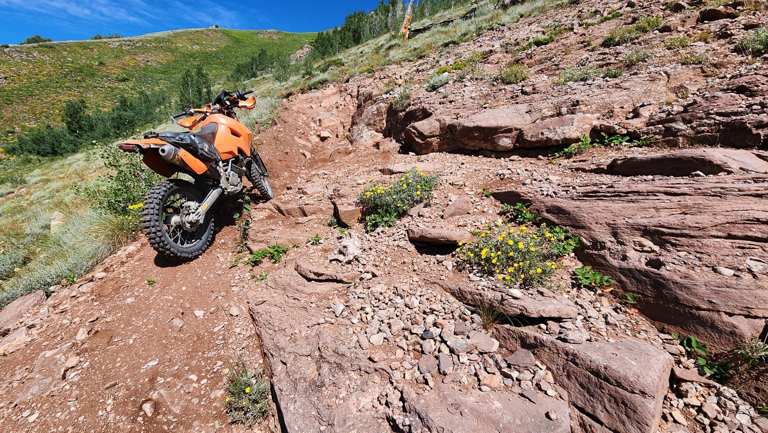 a motorcycle on rocky mountains slope