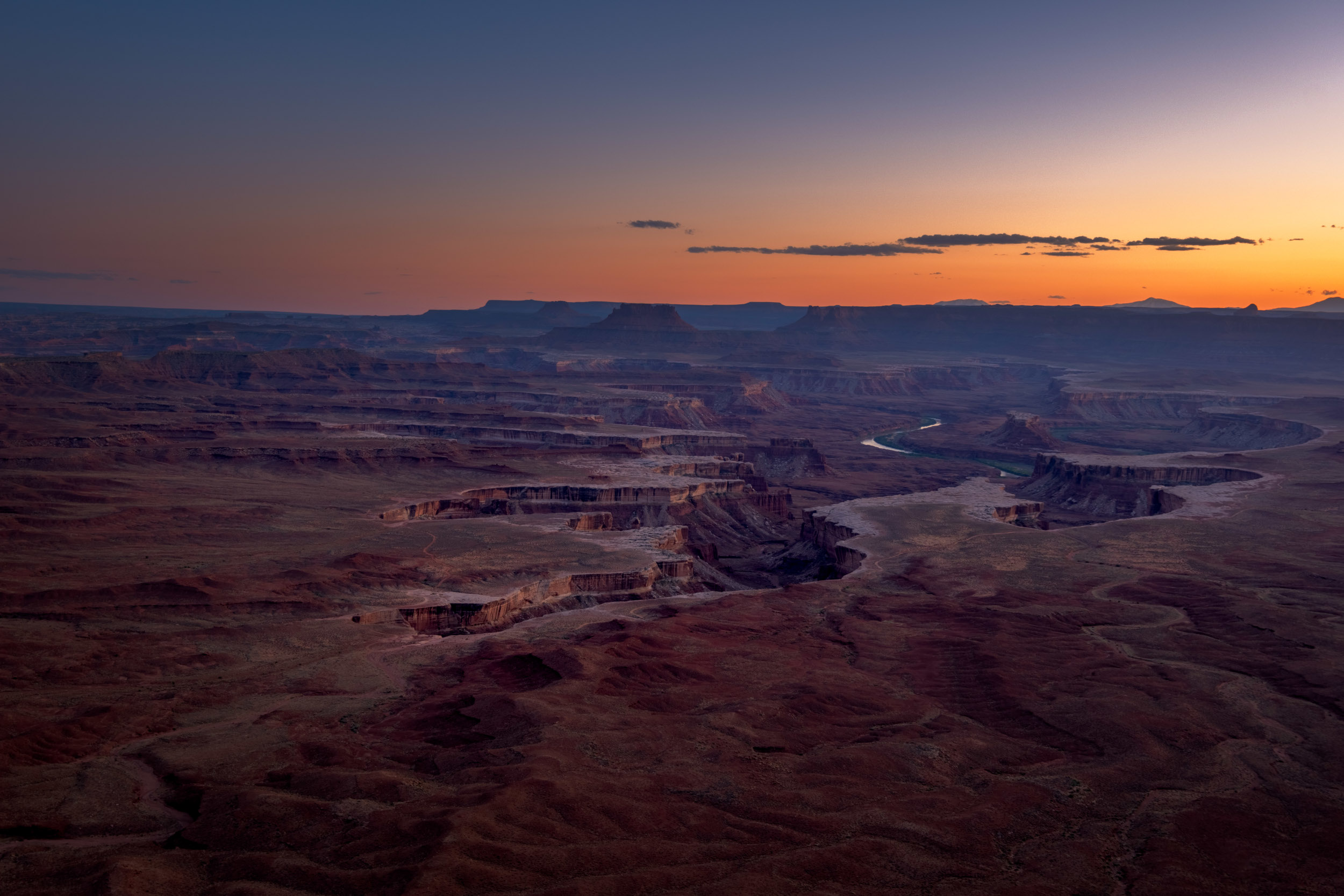 a view of maze like canyon-edge after sunset