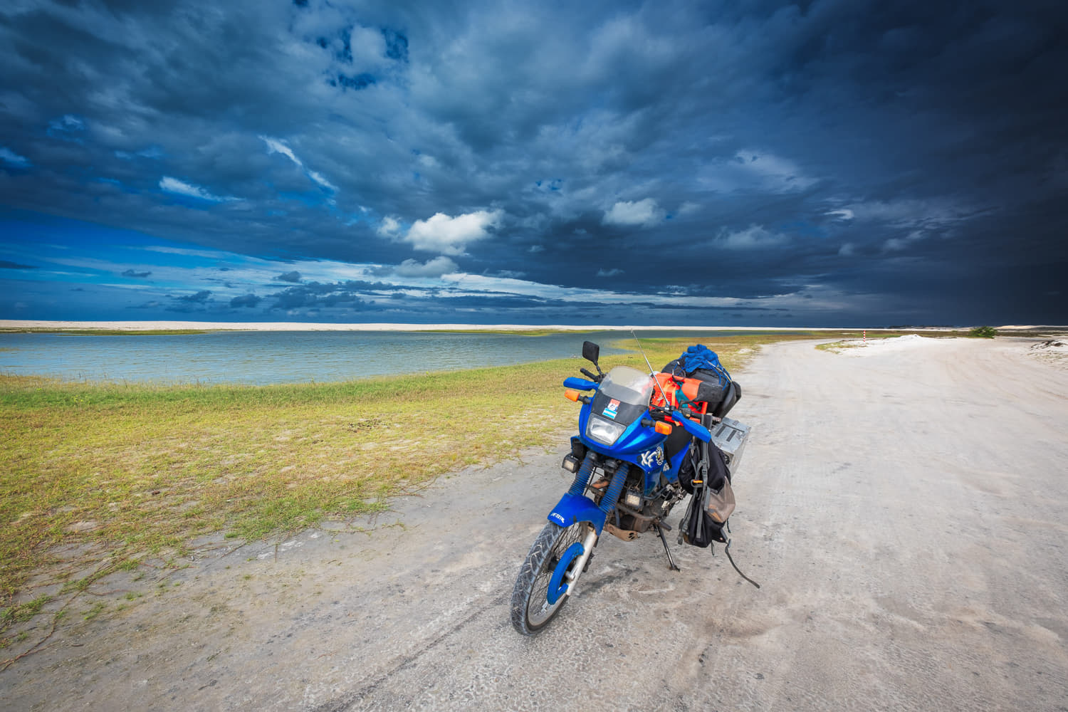 motorcycle parked on a beach