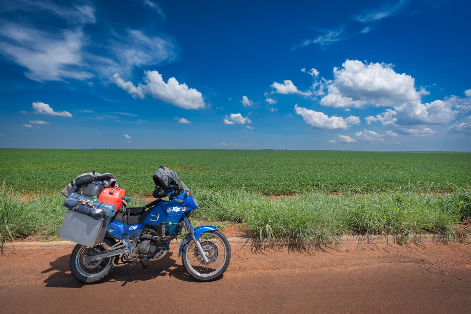  motorcycle and endless soy bean farms behind