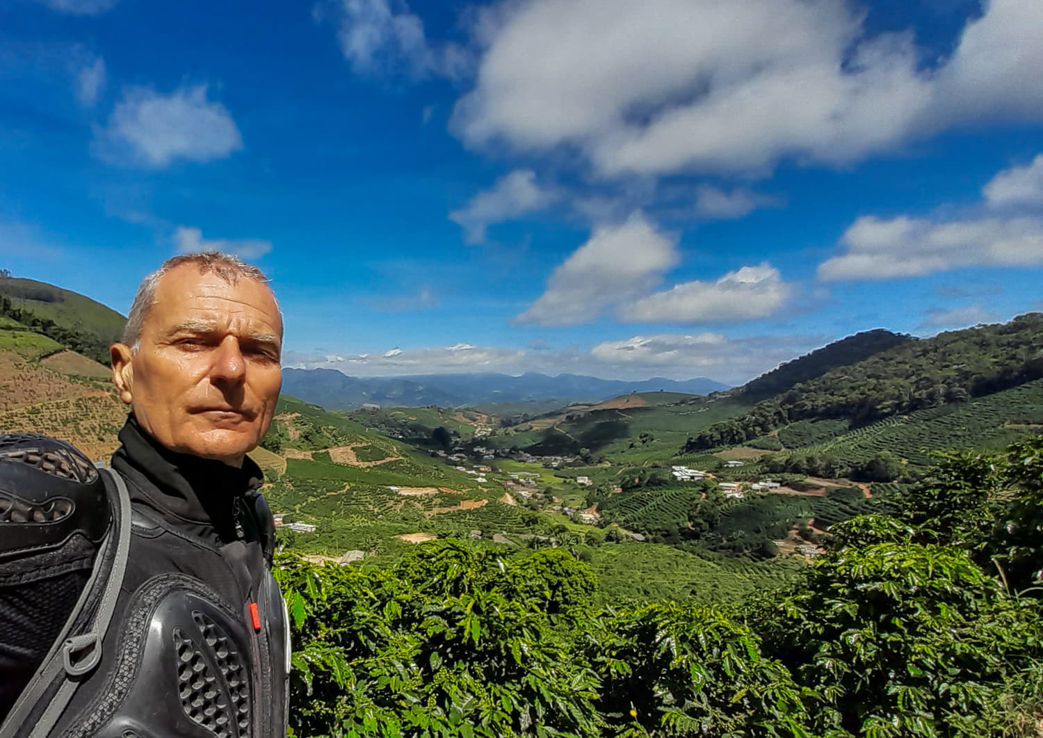 selfie on a hilly coffee plantation