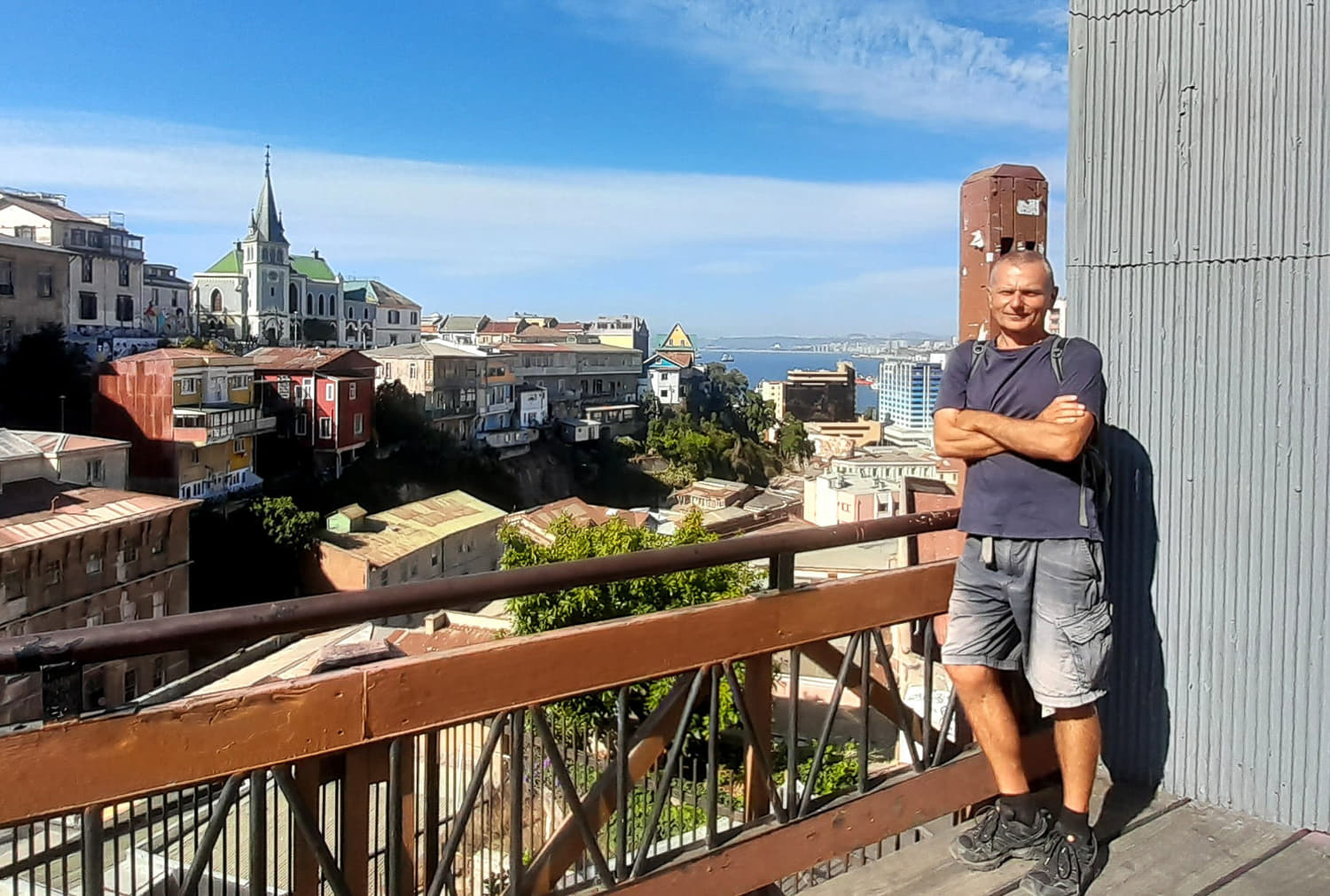 person posing on a balcony 