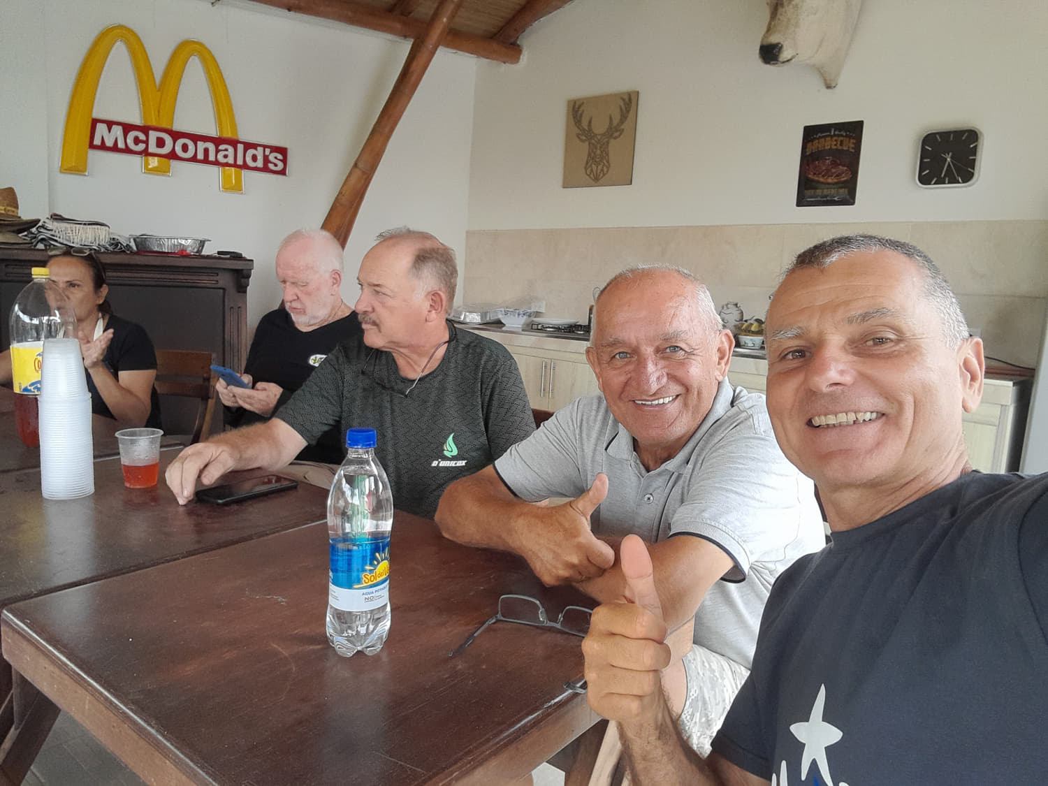 a group of people sitting at a table