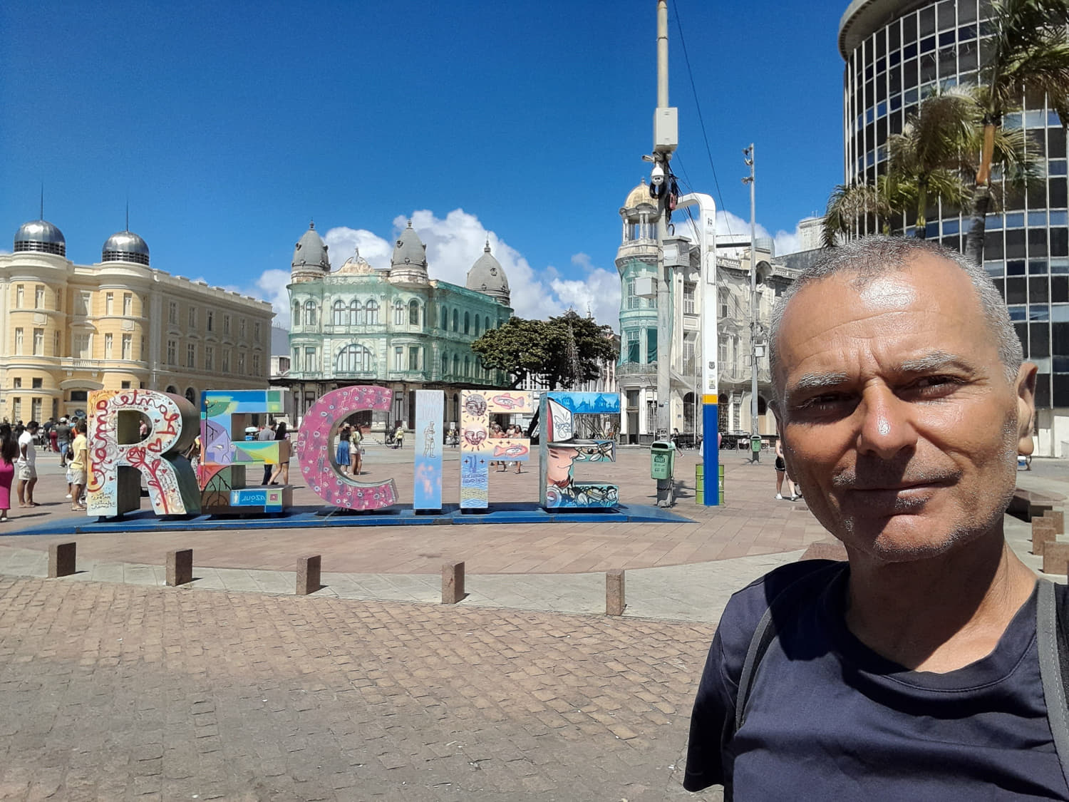 selfie in front of sign Recife