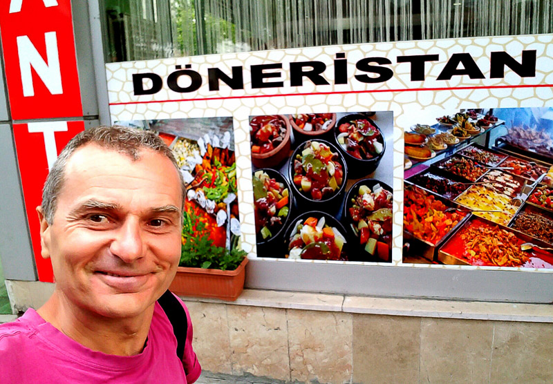 Selfie in front of a Kebab shop called Doneristan