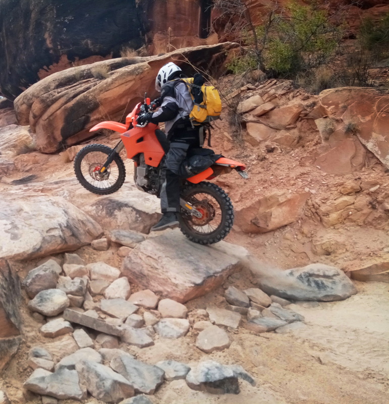 rider going up rock steps