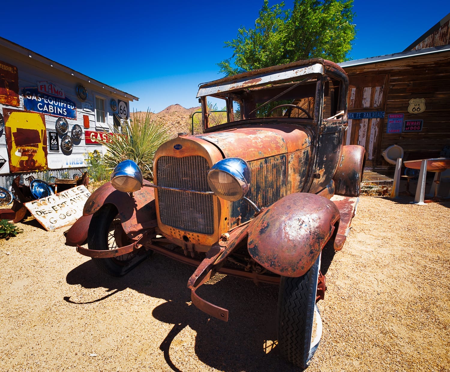 Old, rusty Ford car 