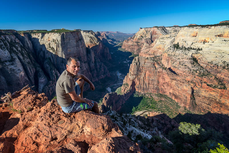 sitting at the edge, high above canyon