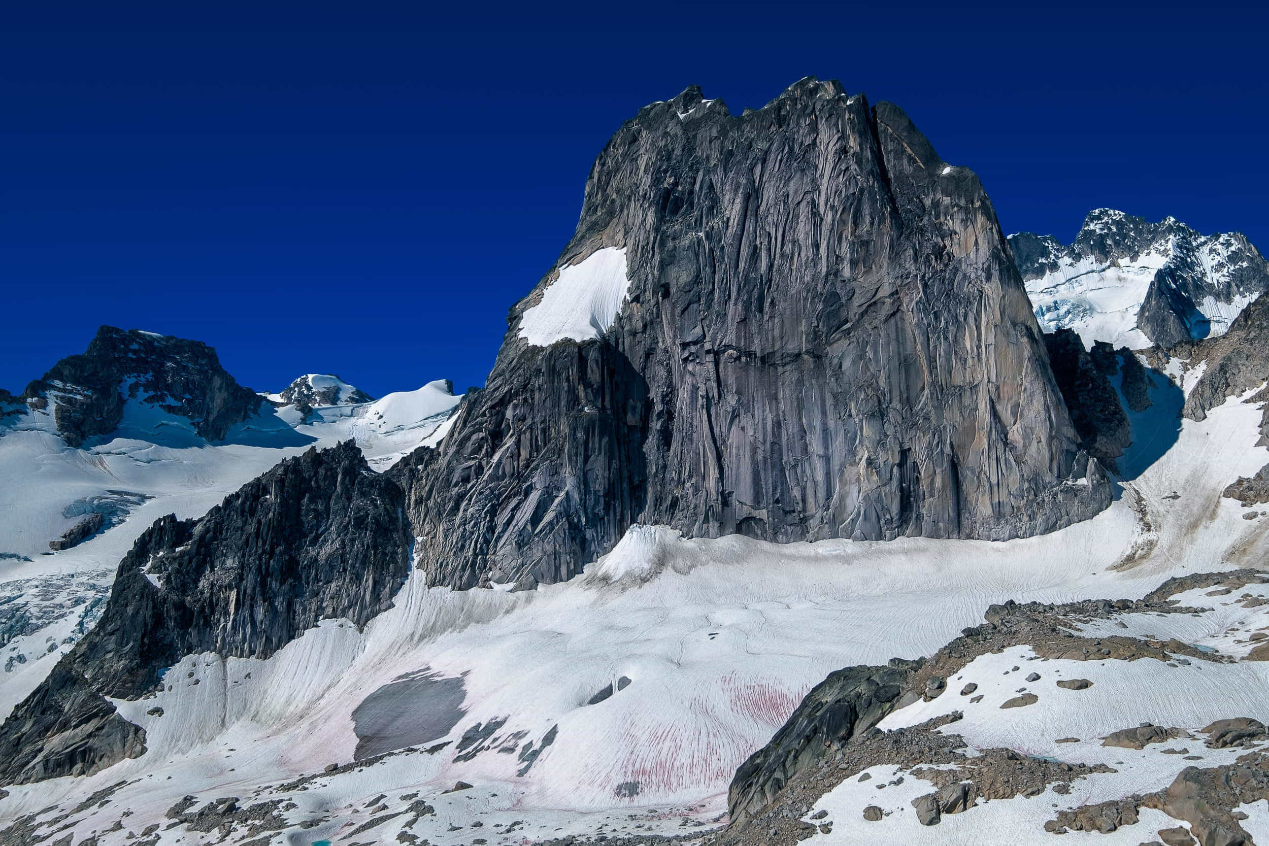 rock spire surrounded by a glacier 