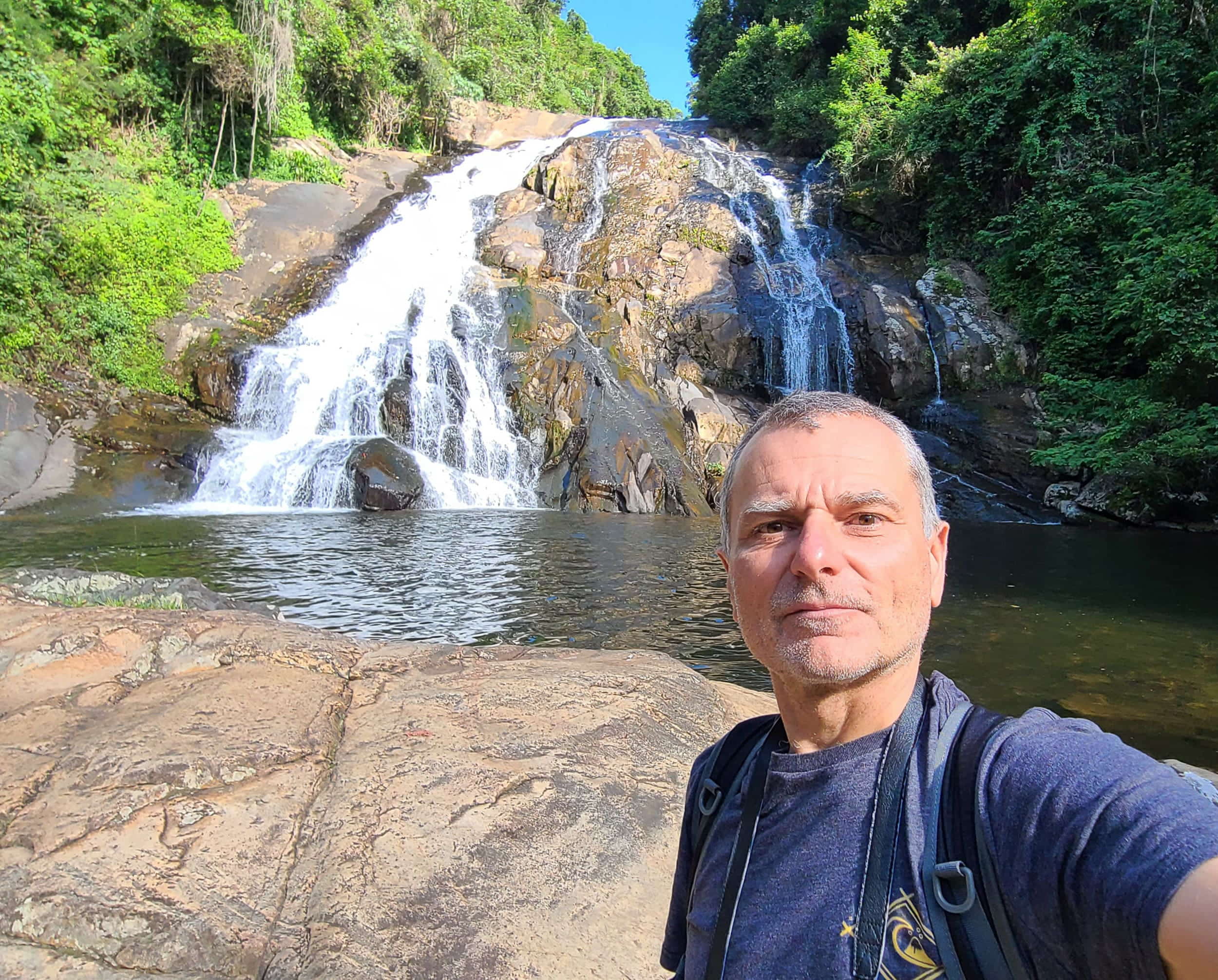 Selfie in front of a waterfall